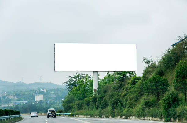 istock Blank billboard on blue sky background for new advertisement 1061133810