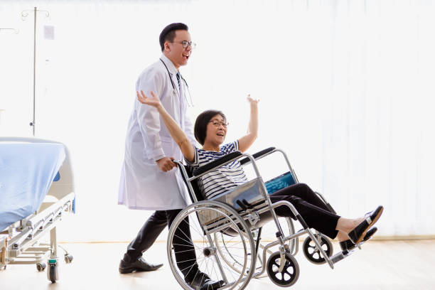 istock Asian men doctor caring about elderly woman 1061138832
