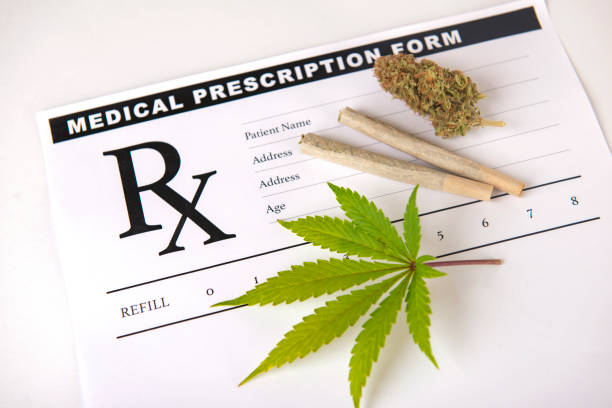 istock Medical marijuana prescription - cannabis concept background 1061143582
