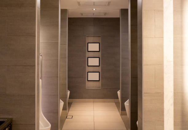 istock Luxury brown public toilet with rows ceramic urinal 1061147274