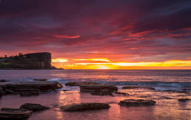 istock Blazing red  sunrise skies from the beach Australia 1061148848