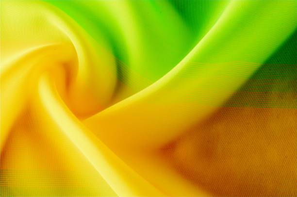 istock Texture, background, pattern. Silk fabric is transparent, dark orange, dark red, dark green, saturated colors. 1061149392