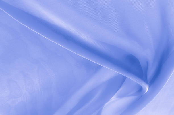 istock Texture, background, pattern. Pale blue clear silk cloth. SKY BLUE, also known as PALE BLUE, BABY BLUE, POWDER BLUE 1061149484