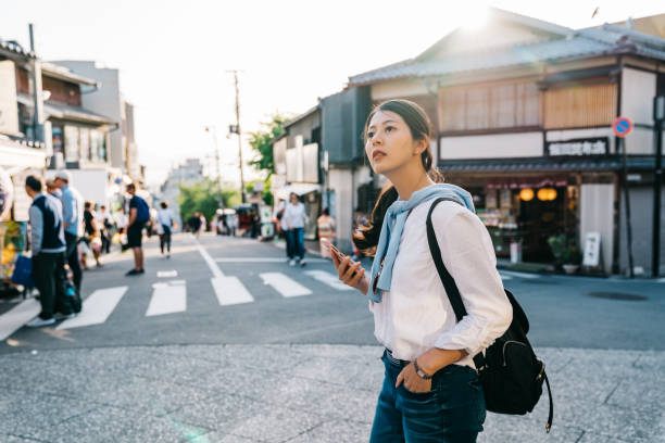 istock beautiful traveler crossing the road 1061155992
