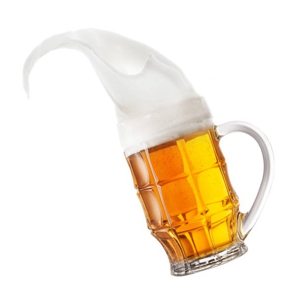 istock Mug of light beer with splashing foam 1061159430
