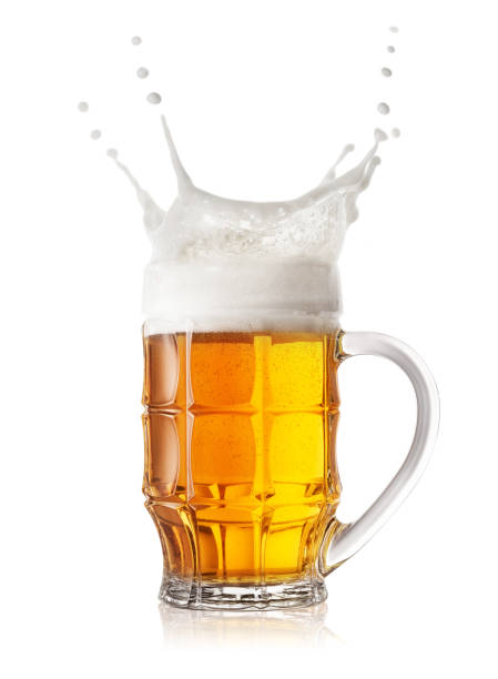 istock Splash in a faceted beer mug 1061159436