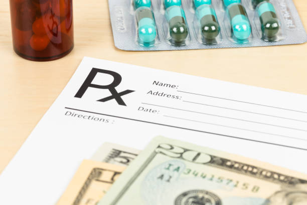istock Blank prescription, banknote, and medicine 1061168546