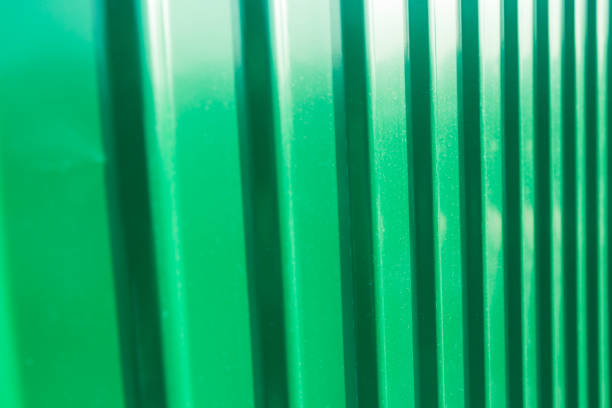 istock Green fence steel sheet texture 1061169784