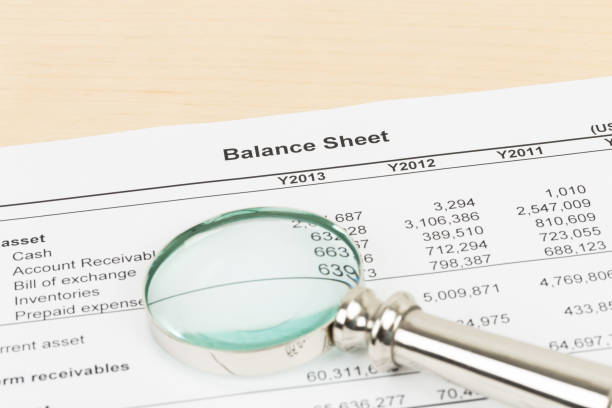 istock Balance sheet financial report with pen; document is mock-up 1061169966