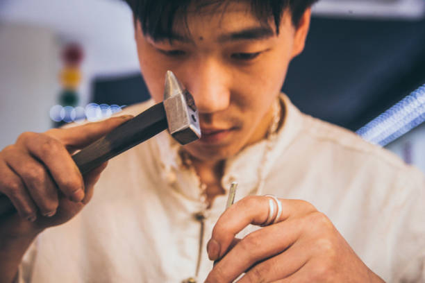 istock Asian Jeweler working 1061179906