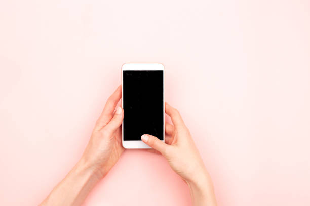 istock Woman hands and a smartphone 1061187428