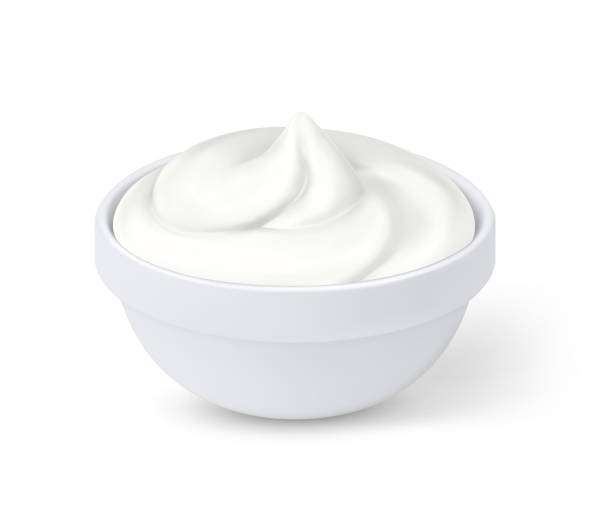 istock SD Realistic sour cream in bowl, mayonnaise, yogurt, isolated on white background. Vector illustration 1061189484