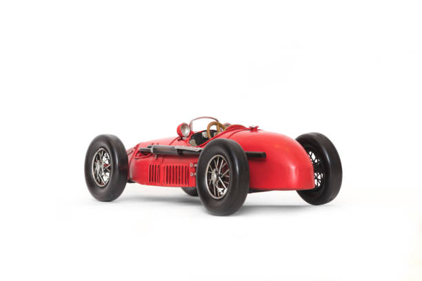 istock Vintage race car model isolated on white background 1061190140