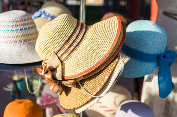 istock Woman's straw hats with graceful bows, close up 1061191650