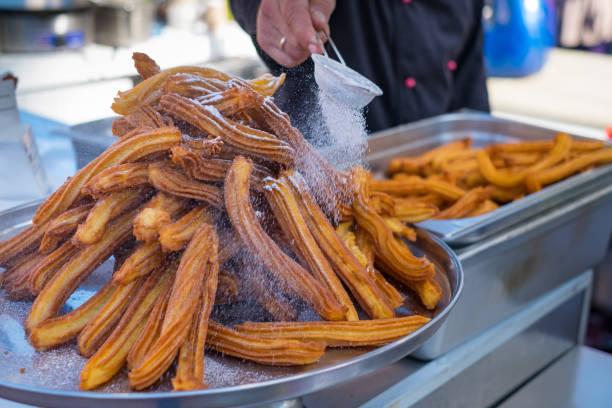istock Delicious churros sticks deep fried and dusted with powdered sugar 1061192026