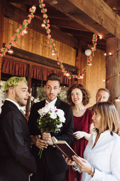 istock gay Men Exchanging Vows On Their Wedding Day 1061195672