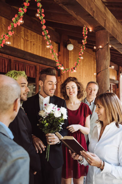 istock gay Men Exchanging Vows On Their Wedding Day 1061195916