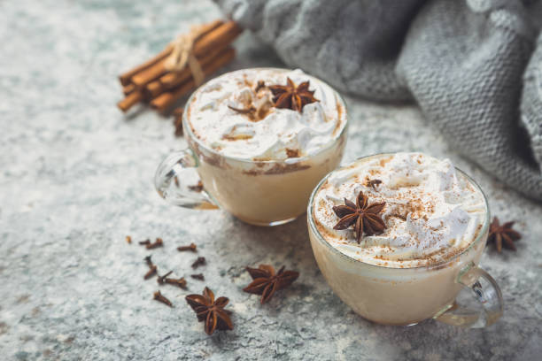 Chai latte and ingredients on concrete background