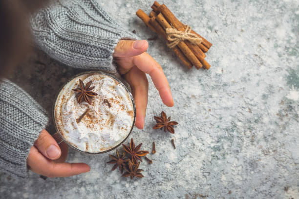 istock Hands holding cup of chai latte 1061197642