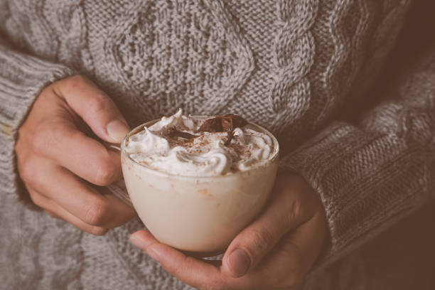 istock Hands holding cup of chai latte 1061197652