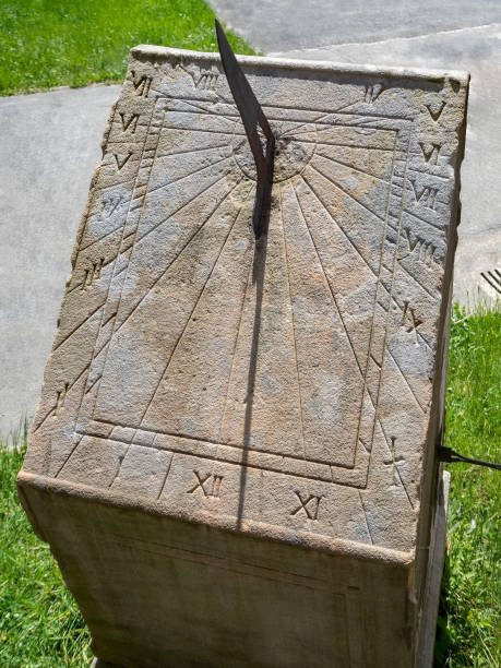 This stone sundial, located in the historic city of Tarragona, displays numerical engravings and hour lines, reflecting the ancient measurement of time.