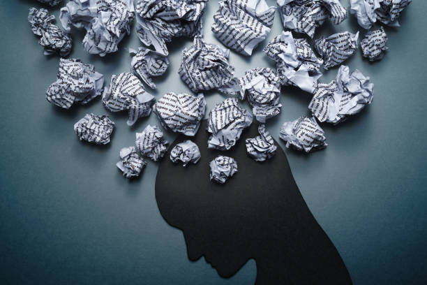 istock Silhouette of depressed person head. 1061203780