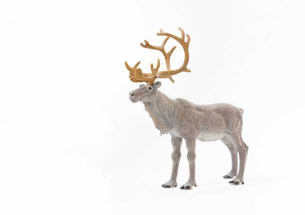 istock Figurine of a deer on a white background. Element for Christmas, New Year.Side view 1061217166