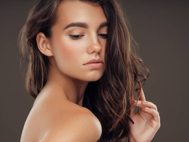 istock Young beautiful model with long wavy well groomed hair 1061221674