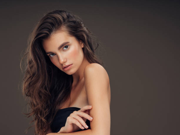 istock Young beautiful model with long wavy well groomed hair 1061221732