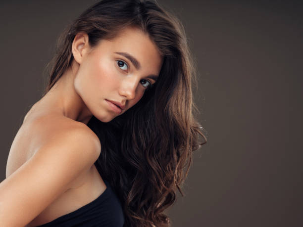 istock Young beautiful model with long wavy well groomed hair 1061221962