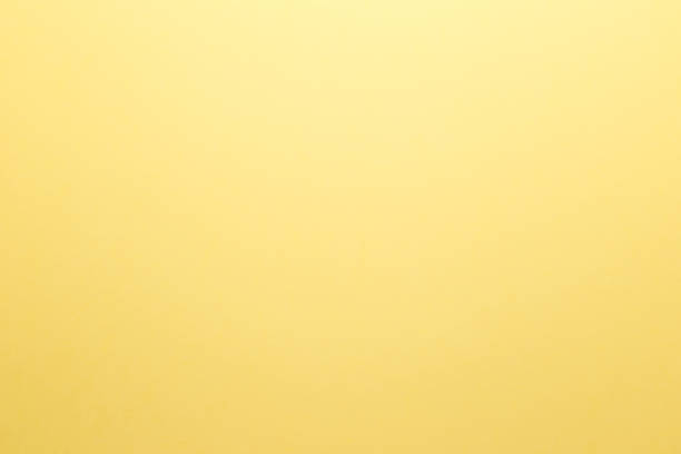 istock Abstract yellow background. Yellow paper. Bright halftone pattern. Light paper texture for luxury elegant backdrop design wallpaper or template 1061223668