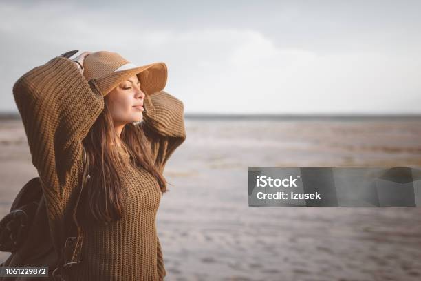 Outdoor Shot Of Young Woman Resting On The Desert Stock Photo - Download Image Now - Independence - Concept, Individuality, Only Women