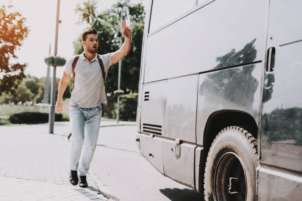 istock Young Handsome Tourist almost Late for Bus 1061230486