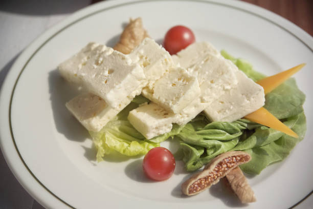 istock plate of cheese arrangement on breakfast table 1061231624