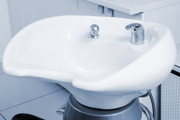 istock white sink in modern barber shop 1061233382