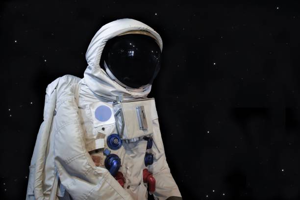 istock Astronaunt low angle shot and star background 1061238870