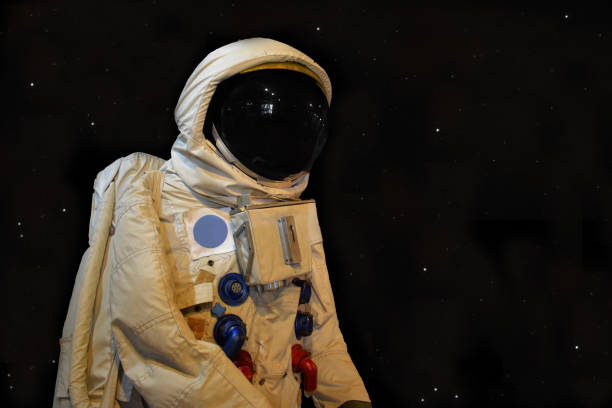 istock Astronaunt low angle shot and star background 1061238944