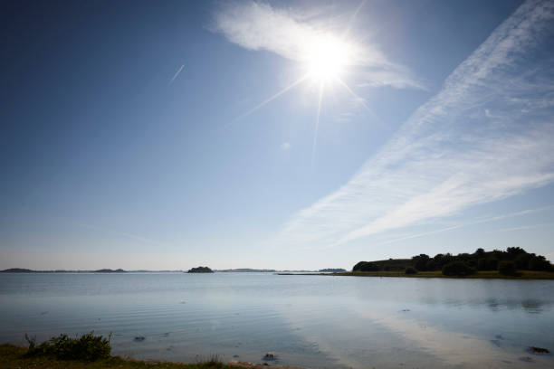 istock Clouded blue sky over the sea 1061239212