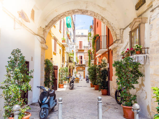 View of a narrow street in the Italian city Bari View of a narrow street in the Italian city Bari. Bari is the capital city of the Metropolitan City of Bari and of the Apulia region, on the Adriatic Sea, in southern Italy bari photos stock pictures, royalty-free photos & images