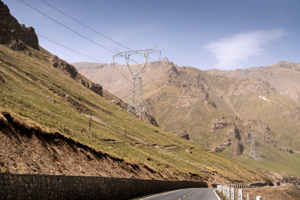 istock The highway is against the snowy mountain sky 1061262836