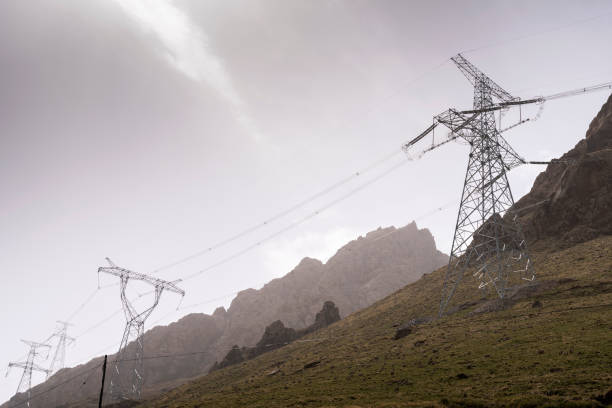 istock Power towers on the mountain and sky background 1061262840