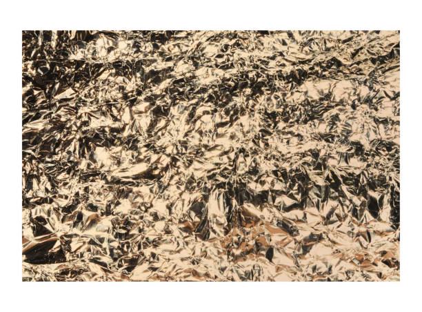 istock Rose gold crumpled foil texture isolated on white background 1061263284