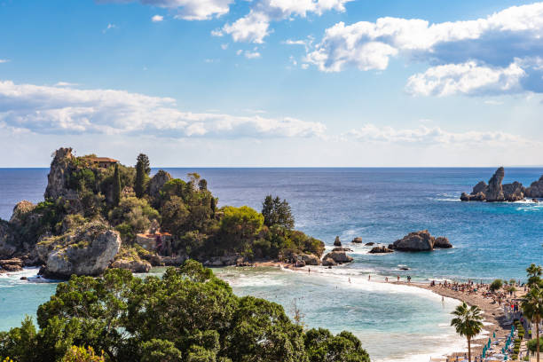 Beautiful beach at Isola Bella in Taormina, Sicily, Italy. Beautiful beach at Isola Bella in Taormina, Sicily, Italy. giardini naxos stock pictures, royalty-free photos & images