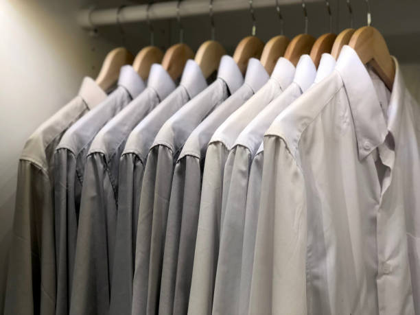 istock Shirts Hanging On Coathanger In Rack 1061285836
