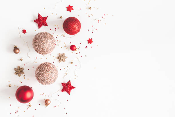 istock Christmas composition. Christmas red and golden decorations on white background. Flat lay, top view, copy space 1061300346