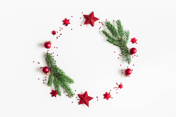 istock Christmas composition. Fir tree branches, red and green decorations on white background. Christmas, winter, new year concept. Flat lay, top view, copy space 1061300810