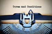 Drafting terms and conditions of an agreement using a retro typewriter