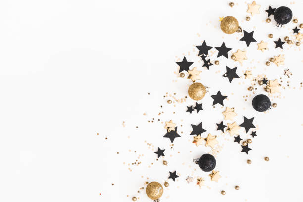istock Christmas composition. Christmas golden and black decorations on white background. Flat lay, top view, copy space 1061303328