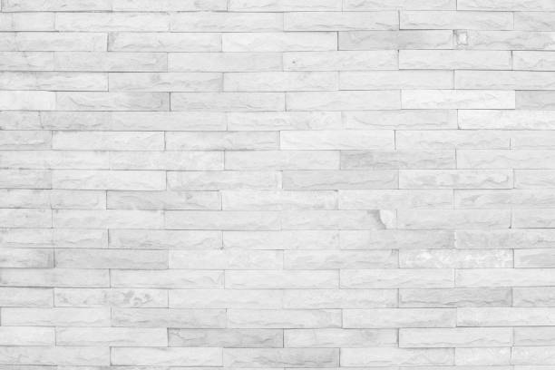 istock Seamless Grey pattern of decorative brick sandstone wall surface with concrete of modern style design decorative uneven have cracked realmasonry wall of multicolored stones or blocks with cement. 1061315526