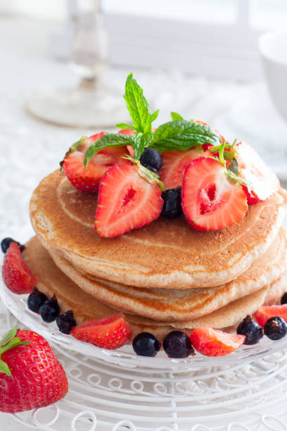 istock Breakfast with pankakes from whole wheat flour and fresh berries, selective focus 1061319192